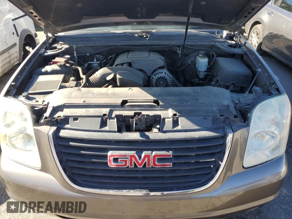 2012 GMC Yukon SLT with VIN 1GKS1CE03CR137258, listed as a Copart auction lot 87684815 with 253,348 mi miles and Salvage Title. Bid and sale history available at carsss.com. Image 12.