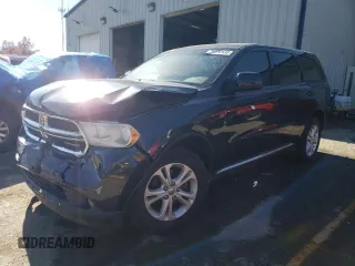 2013 Dodge Durango SXT with VIN 1C4RDJAG4DC529601, listed as a Copart auction lot 74312433 with 245,700 mi miles and Salvage Title. Bid and sale history available at carsss.com. Image 1.