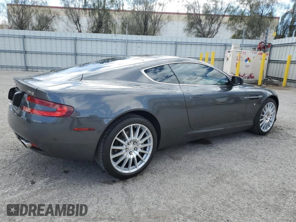 2007 Aston Martin DB9 z VIN SCFAD01A77GA07808, wystawiony jako Copart lot #48063115 z przebiegiem 53 195 mil mil oraz Szkody całkowita. Historia ofert i sprzedaży dostępna na DreamBid. Obrazek 3.