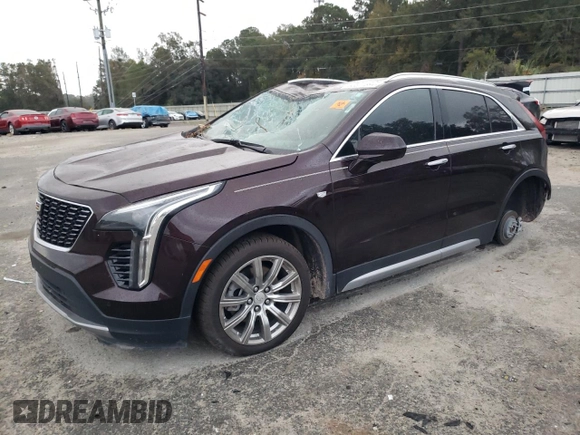 2020 Cadillac XT4 FWD Premium Luxury with VIN 1GYFZCR42LF149030, listed as a Copart auction lot 82671894 with 88,570 mi miles and Salvage title. Bid and sale history available at DreamBid. Image 1.