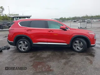 2022 Hyundai Santa Fe SEL z VIN 5NMS24AJ7NH431010, wystawiony jako IAAI lot #42235797 z przebiegiem 18 496 mil mil oraz . Historia ofert i sprzedaży dostępna na DreamBid. Obrazek 14.