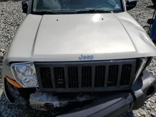 2007 Jeep Commander Sport z VIN 1J8HG48K67C651209, wystawiony jako Copart lot #64049035 z przebiegiem 216 628 mil mil oraz Szkoda całkowita • Salvage title. Historia ofert i sprzedaży dostępna na DreamBid. Obrazek 12.