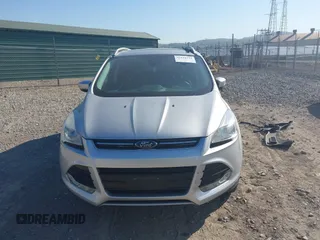2016 Ford Escape Titanium with VIN 1FMCU9JX2GUA50916, listed as a IAAI auction lot 42118711 with 121,405 mi miles. Bid and sale history available at carsss.com. Image 13.