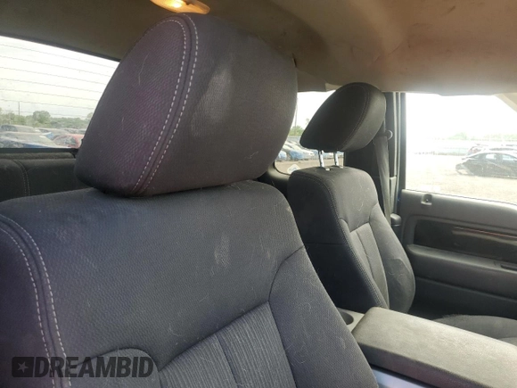2009 Ford F-150 XL z VIN 1FTPX14V69FB16769, wystawiony jako Copart lot #57498575 z przebiegiem 168 162 mil mil oraz Szkoda całkowita • Salvage title. Historia ofert i sprzedaży dostępna na DreamBid. Obrazek 10.