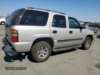 2005 Chevrolet Tahoe LT with VIN 1GNEC13T35R103206, listed as a Copart auction lot 74310784 with 128,780 mi miles and Salvage Title. Bid and sale history available at carsss.com. Image 3.