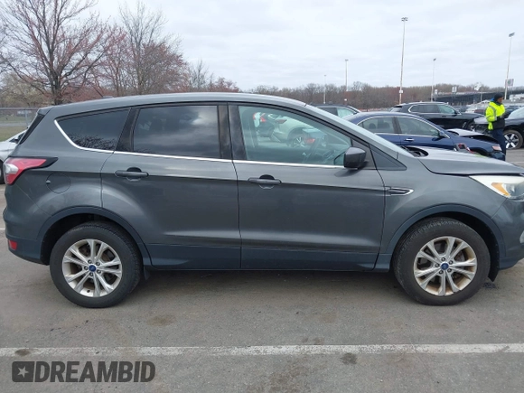 2017 Ford Escape SE with VIN 1FMCU9GD2HUD71238, listed as a IAAI auction lot 41941694 with 114,327 mi miles and . Bid and sale history available at DreamBid. Image 13.