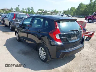 2015 Honda Fit LX z VIN 3HGGK5H51FM724566, wystawiony jako IAAI lot #42151755 z przebiegiem 168 744 mil mil oraz . Historia ofert i sprzedaży dostępna na DreamBid. Obrazek 3.