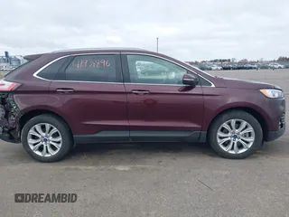 2020 Ford Edge Titanium z VIN 2FMPK4K91LBB56297, wystawiony jako IAAI lot #41938896 z przebiegiem 79 875 mil mil oraz . Historia ofert i sprzedaży dostępna na DreamBid. Obrazek 13.
