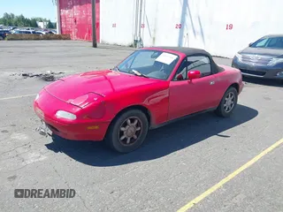 1993 Mazda MX-5 Miata with VIN JM1NA3513P0414468, listed as a IAAI auction lot 42653718 with 292,497 mi miles and . Bid and sale history available at DreamBid. Image 2.