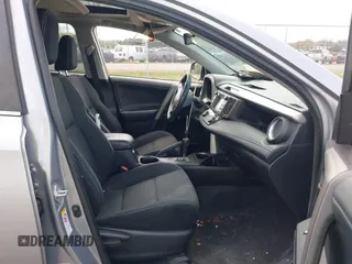 2018 Toyota RAV4 XLE with VIN 2T3WFREV9JW410102, listed as a IAAI auction lot 41929892 with 75,422 mi miles and . Bid and sale history available at carsss.com. Image 5.