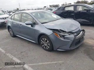 2022 Toyota Corolla Hybrid LE with VIN JTDEAMDE4NJ041913, listed as a IAAI auction lot 41883490 with 23,063 mi miles. Bid and sale history available at carsss.com. Image 1.