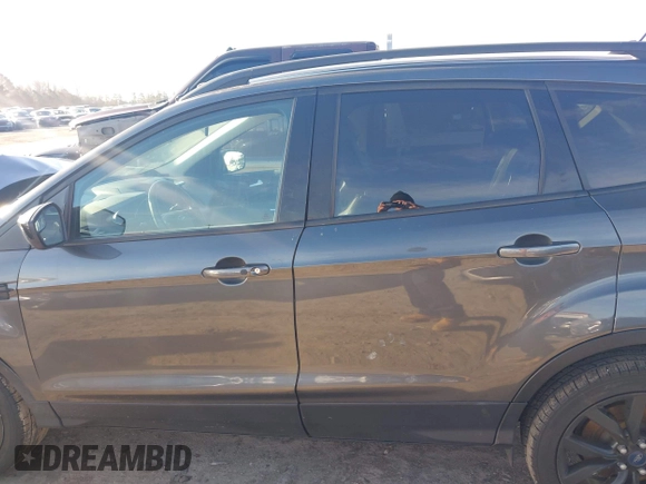 2019 Ford Escape SE z VIN 1FMCU0GD4KUA91551, wystawiony jako IAAI lot #41590151 z przebiegiem Nie podano mil oraz . Historia ofert i sprzedaży dostępna na DreamBid. Obrazek 15.