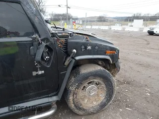 2007 Hummer H2 SUV z VIN 5GRGN23UX7H111093, wystawiony jako IAAI lot #41262675 z przebiegiem Nie podano mil oraz . Historia ofert i sprzedaży dostępna na DreamBid. Obrazek 21.