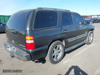 2003 Chevrolet Tahoe LS with VIN 1GNEC13V03R112315, listed as a IAAI auction lot 41424247 with 256,017 mi miles. Bid and sale history available at carsss.com. Image 4.