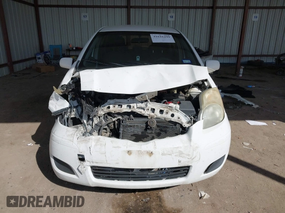 2009 Toyota Yaris with VIN JTDKT903295244862, listed as a IAAI auction lot 41616299 with 213,078 mi miles and . Bid and sale history available at DreamBid. Image 12.