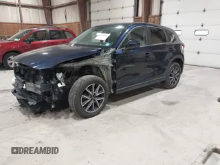 2018 Mazda CX-5 Touring with VIN JM3KFBCM5J0434716, listed as a IAAI auction lot 41738956 with 108,264 mi miles and . Bid and sale history available at DreamBid. Image 2.