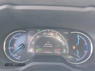 2021 Toyota RAV4 Hybrid XSE with VIN JTME6RFV4MJ008825, listed as a IAAI auction lot 42060148 with 91,129 mi miles and . Bid and sale history available at DreamBid. Image 7.
