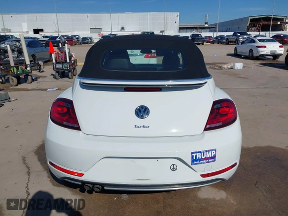2019 Volkswagen Beetle S with VIN 3VW5DAAT0KM507437, listed as a IAAI auction lot 41380821 with 28,010 mi miles and . Bid and sale history available at DreamBid. Image 16.