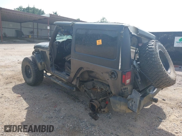 2014 Jeep Wrangler Sport with VIN 1C4AJWAGXEL233647, listed as a IAAI auction lot 39993785 with Not Provided miles and . Bid and sale history available at DreamBid. Image 3.