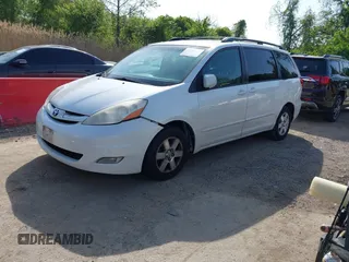 2009 Toyota Sienna XLE with VIN 5TDZK22C19S262107, listed as a IAAI auction lot 42158864 with 186,711 mi miles. Bid and sale history available at carsss.com. Image 2.