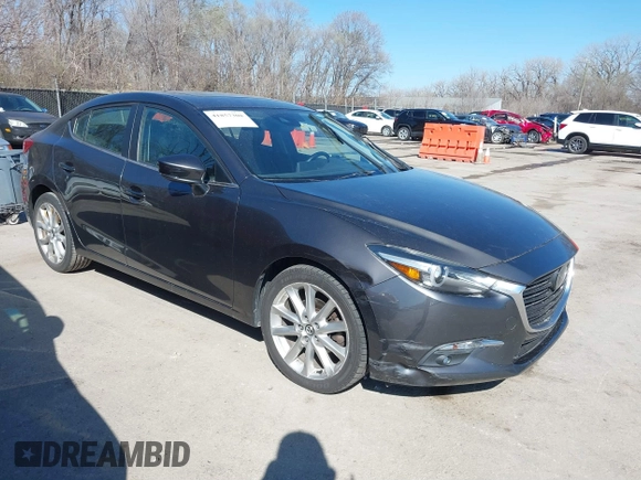 2017 Mazda 3 Grand Touring z VIN 3MZBN1W39HM137879, wystawiony jako IAAI lot #41857308 z przebiegiem 73 569 mil mil oraz . Historia ofert i sprzedaży dostępna na DreamBid. Obrazek 1.