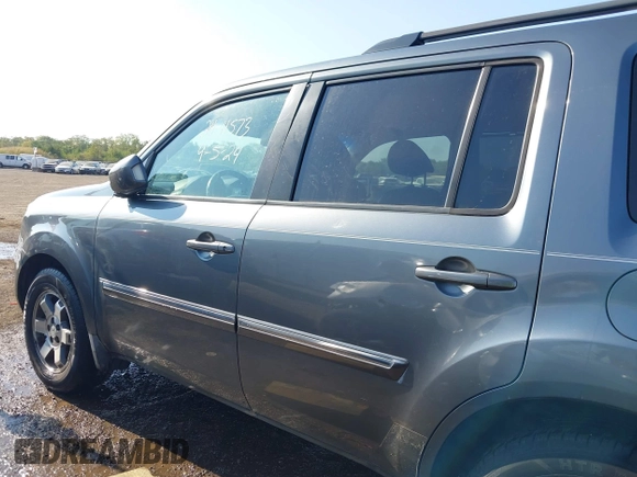 2010 Honda Pilot Touring with VIN 5FNYF3H87AB006023, listed as a IAAI auction lot 40310546 with 135,482 mi miles and . Bid and sale history available at carsss.com. Image 14.