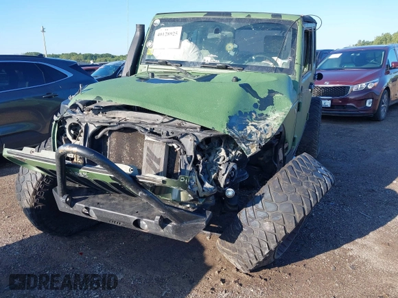 2008 Jeep Wrangler Unlimited X z VIN 1J4GA39198L612727, wystawiony jako IAAI lot #40128925 z przebiegiem 260 573 mil mil oraz . Historia ofert i sprzedaży dostępna na DreamBid. Obrazek 6.