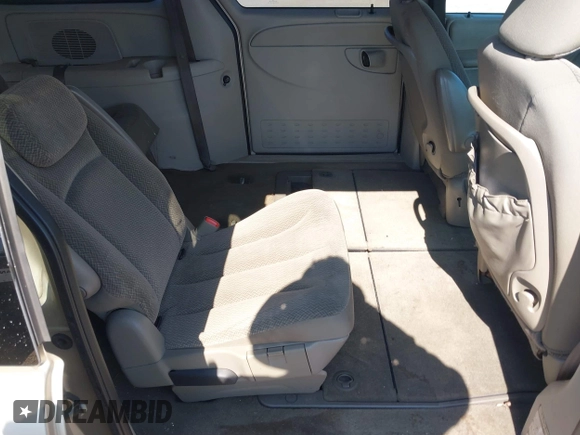 2005 Dodge Caravan SXT with VIN 2D8GP44L05R459369, listed as a IAAI auction lot 42638057 with 76,777 mi miles and . Bid and sale history available at DreamBid. Image 8.