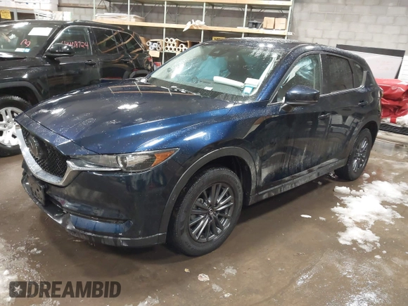 2020 Mazda CX-5 Touring z VIN JM3KFBCM9L0843045, wystawiony jako IAAI lot #41361008 z przebiegiem 76 107 mil mil oraz . Historia ofert i sprzedaży dostępna na DreamBid. Obrazek 17.