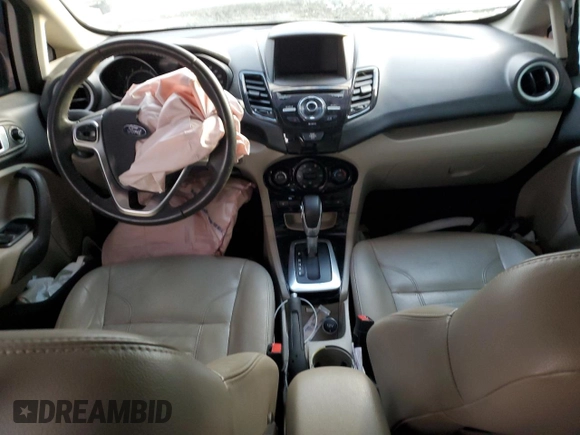 2017 Ford Fiesta Titanium with VIN 3FADP4CJ9HM136313, listed as a Copart auction lot 82610884 with Not Provided miles and Salvage Title. Bid and sale history available at DreamBid. Image 8.