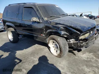 1996 Chevrolet Tahoe with VIN 3GNEK18RXTG150164, listed as a Copart auction lot 77810474 with 300,287 mi miles and Salvage Title. Bid and sale history available at carsss.com. Image 4.