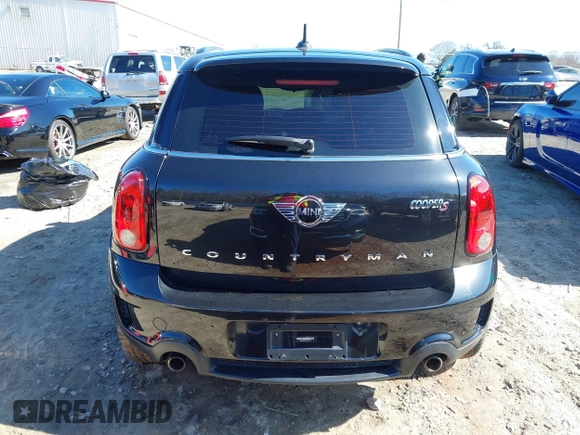 2015 MINI Countryman S with VIN WMWZC3C5XFWT04916, listed as a IAAI auction lot 41636369 with 101,448 mi miles and . Bid and sale history available at DreamBid. Image 16.