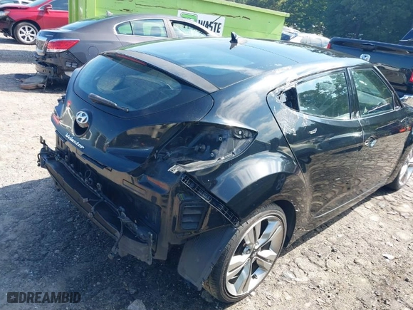 2013 Hyundai Veloster w/Black Int with VIN KMHTC6AD5DU120315, listed as a IAAI auction lot 40062472 with 111,041 mi miles. Bid and sale history available at carsss.com. Image 6.