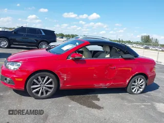 2013 Volkswagen Eos Komfort with VIN WVWBW8AH9DV008763, listed as a IAAI auction lot 41893700 with 53,766 mi miles and . Bid and sale history available at DreamBid. Image 6.