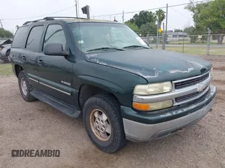 2002 Chevrolet Tahoe LT z VIN 1GNEC13ZX2R279380, wystawiony jako IAAI lot #42324646 z przebiegiem 188 781 mil mil oraz . Historia ofert i sprzedaży dostępna na DreamBid. Obrazek 1.