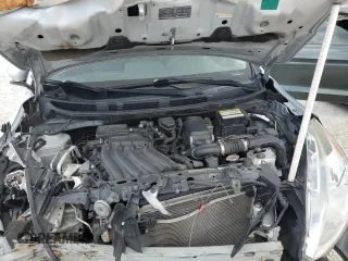 2016 Nissan Versa SV with VIN 3N1CN7AP7GL850033, listed as a Copart auction lot 52629465 with 103,707 mi miles and Salvage Title. Bid and sale history available at DreamBid. Image 11.