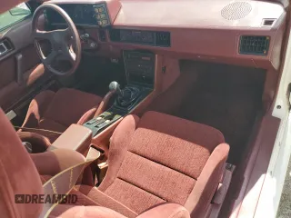 1988 Chrysler Conquest z VIN JJ3CC54N7JZ039025, wystawiony jako Copart lot #66072584 z przebiegiem 79 407 mil mil oraz Szkody całkowita. Historia ofert i sprzedaży dostępna na DreamBid. Obrazek 8.