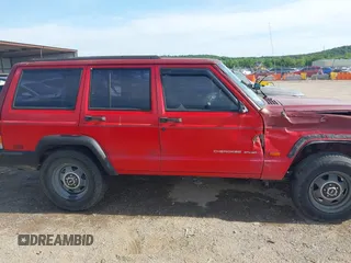 1999 Jeep Cherokee Sport with VIN 1J4FT68S4XL613395, listed as a IAAI auction lot 42316934 with 142,838 mi miles and . Bid and sale history available at DreamBid. Image 14.