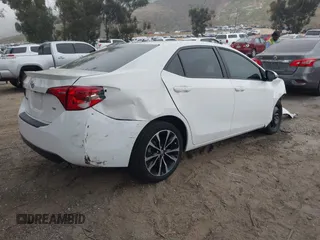 2019 Toyota Corolla L with VIN 5YFBURHE3KP895705, listed as a IAAI auction lot 42034995 with 173,719 mi miles and . Bid and sale history available at DreamBid. Image 4.
