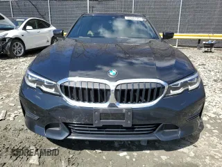 2019 BMW 3 Series 330i with VIN 3MW5R1J5XK8B00074, listed as a Copart auction lot 50806195 with 77,777 mi miles and Salvage Title. Bid and sale history available at carsss.com. Image 5.