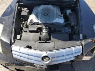 2004 Cadillac XLR z VIN 1G6YV34A345603061, wystawiony jako Copart lot #67412674 z przebiegiem 88 335 mil mil oraz Szkody całkowita. Historia ofert i sprzedaży dostępna na DreamBid. Obrazek 11.
