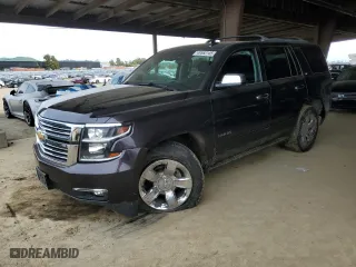 2016 Chevrolet Tahoe LTZ with VIN 1GNSKCKC2GR277192, listed as a Copart auction lot 49552145 with 131,659 mi miles and Salvage Title. Bid and sale history available at carsss.com. Image 1.