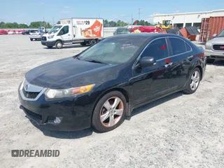 2010 Acura TSX with VIN JH4CU2F67AC037473, listed as a IAAI auction lot 42021853 with 182,648 mi miles. Bid and sale history available at carsss.com. Image 2.