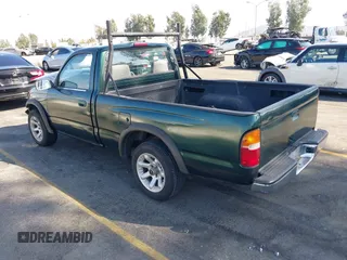1999 Toyota Tacoma with VIN 4TANL42N7XZ481489, listed as a IAAI auction lot 40365153 with 218,971 mi miles. Bid and sale history available at carsss.com. Image 3.