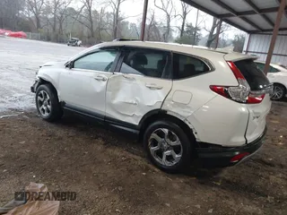 2019 Honda CR-V EX with VIN 2HKRW2H56KH641449, listed as a IAAI auction lot 41762860 with 181,557 mi miles and . Bid and sale history available at DreamBid. Image 3.