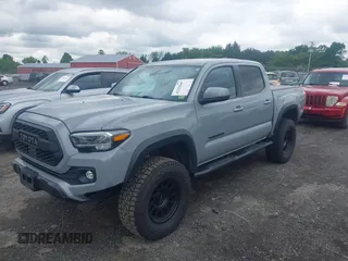 2021 Toyota Tacoma SR with VIN 5TFCZ5AN3MX258746, listed as a IAAI auction lot 42252967 with 62,095 mi miles and . Bid and sale history available at DreamBid. Image 17.