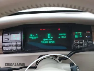 1995 Cadillac DeVille z VIN 1G6KD52B8SU274053, wystawiony jako Copart lot #86429934 z przebiegiem 100 496 mil mil oraz Szkoda całkowita • Salvage title. Historia ofert i sprzedaży dostępna na DreamBid. Obrazek 9.