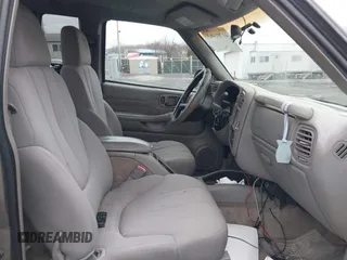2003 GMC Sonoma SLS with VIN 1GTCT19X038212266, listed as a IAAI auction lot 41701463 with 151,555 mi miles. Bid and sale history available at carsss.com. Image 5.