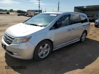 2011 Honda Odyssey Touring with VIN 5FNRL5H95BB096159, listed as a Copart auction lot 60847015 with 182,079 mi miles and Salvage title. Bid and sale history available at DreamBid. Image 1.