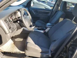 2005 Mazda Tribute i with VIN 4F2YZ02Z75KM57730, listed as a Copart auction lot 82480024 with 188,236 mi miles and Salvage Title. Bid and sale history available at carsss.com. Image 7.